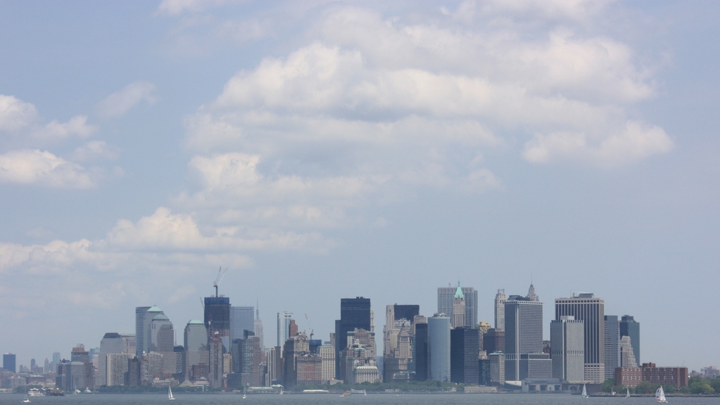 View of clouds over New York Manhattan from Ferry boat